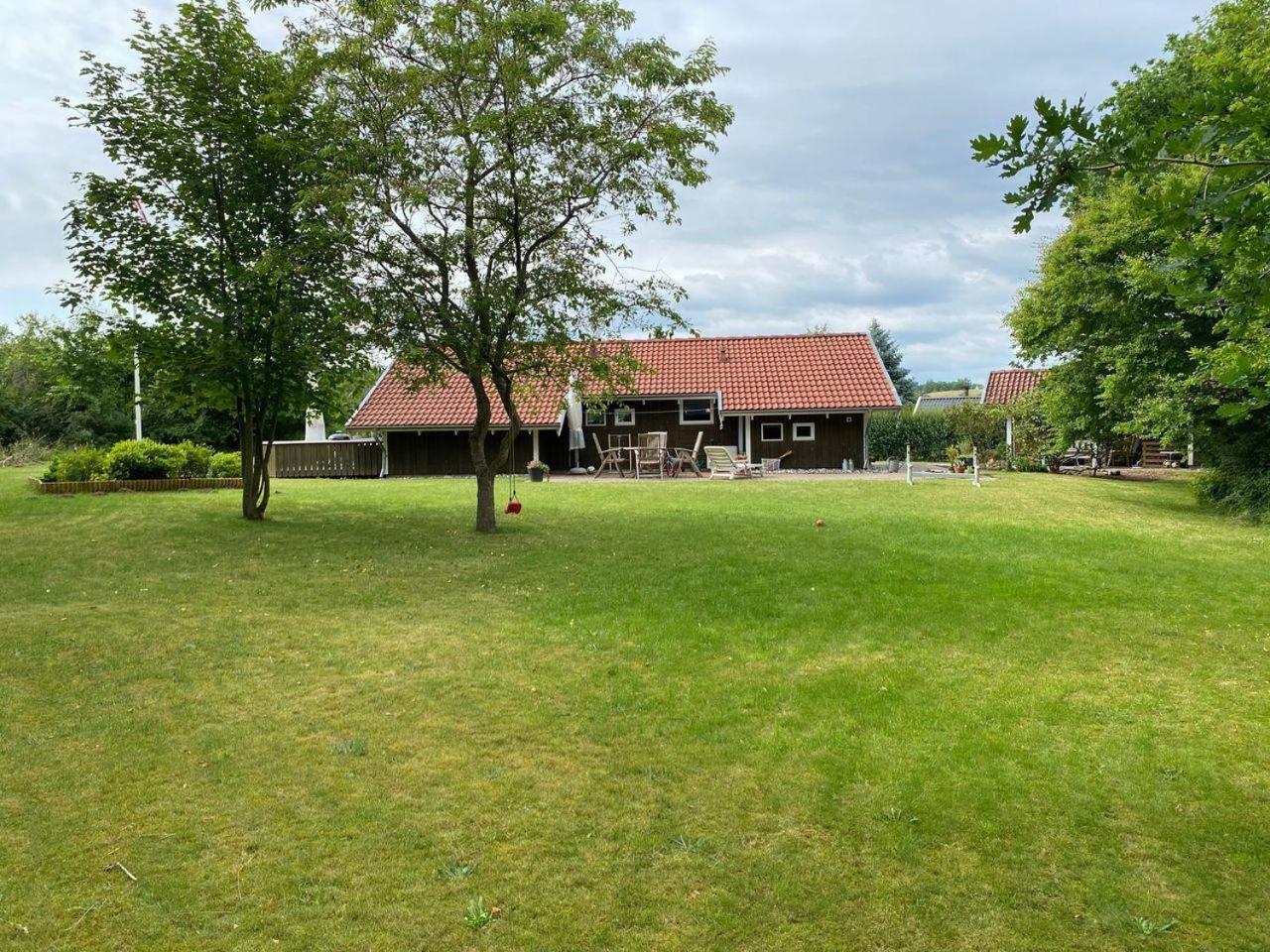At Lovely Lyngsbæk Strand Near Ebeltoft, This Lovely Holiday Home Is At The End Of A Blind Path On A Beautiful, Large, Enclosed Plot, It Only Takes Approx,
