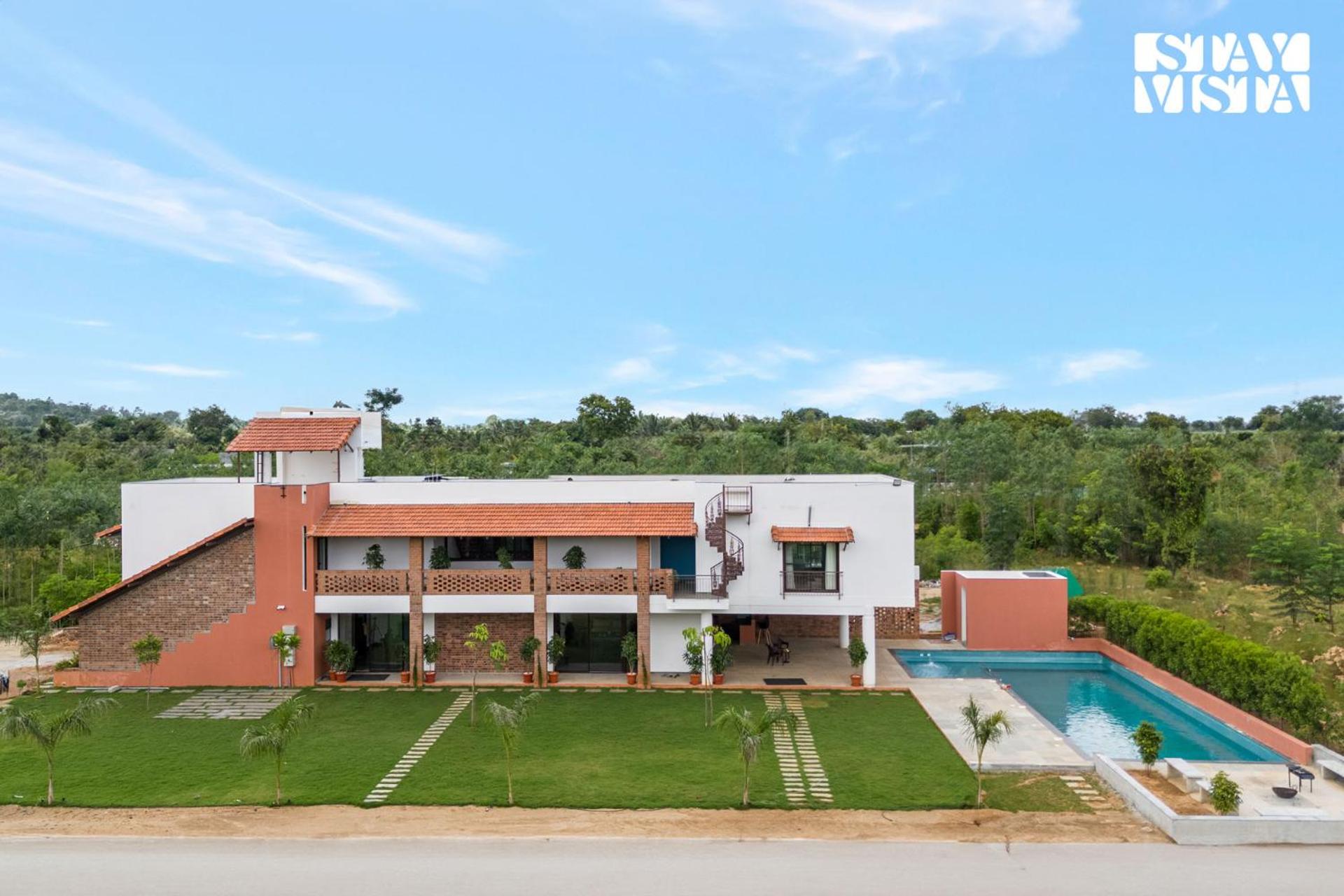 StayVista at Cadenza Villa - Free Breakfast, Private Pool & Lawn view 2