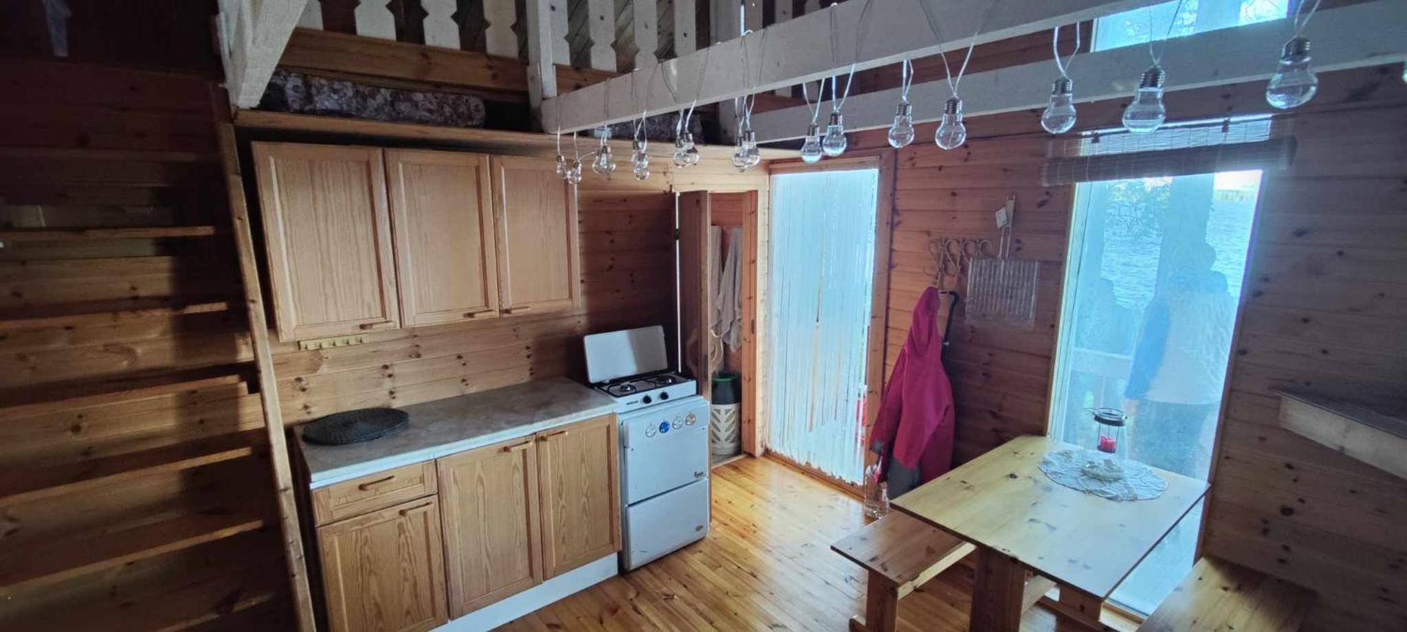 Traditional Finnish lakeside off-grid cabin
