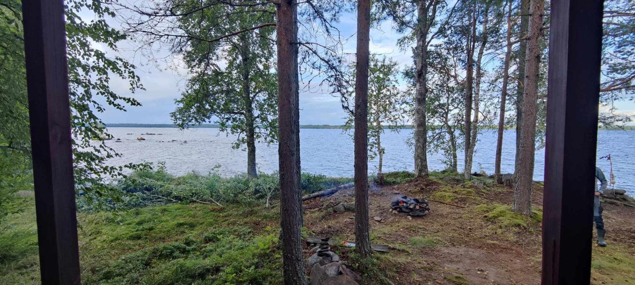 Traditional Finnish lakeside off-grid cabin