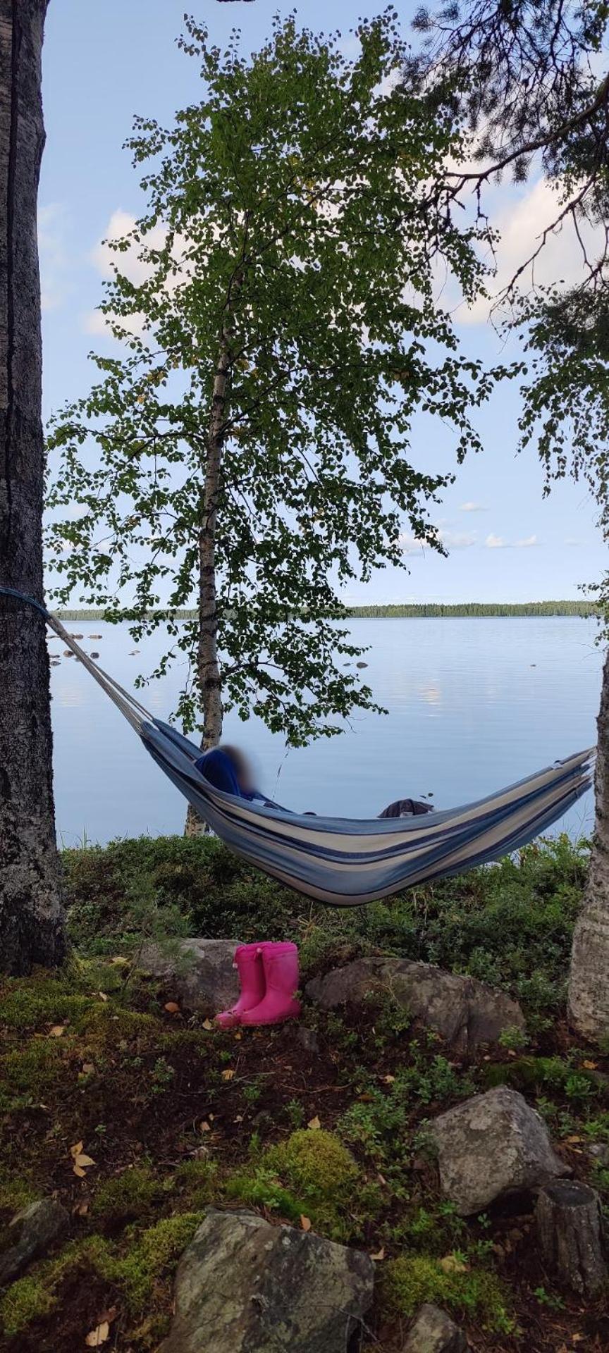 Traditional Finnish lakeside off-grid cabin
