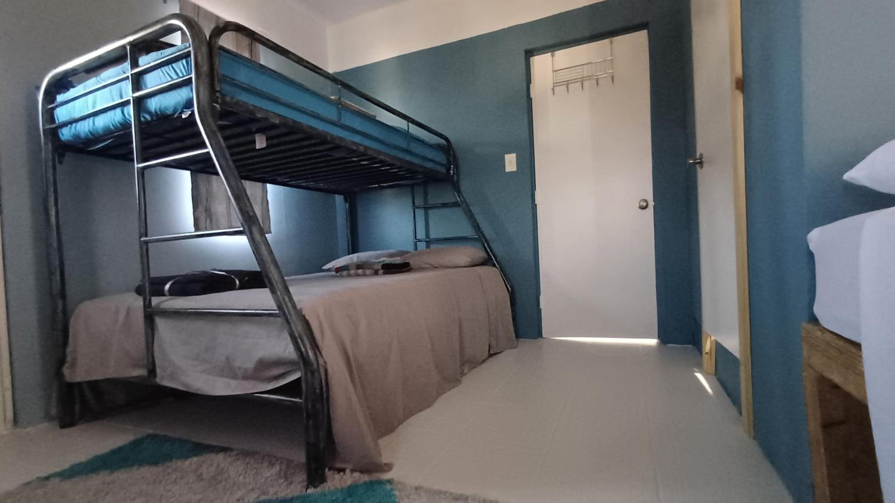 Rooster Run Guest House offers Vieques travelers newly furnished quaint affordable airconditioned rooms and only steps from the Ferry and nearby beaches view 4