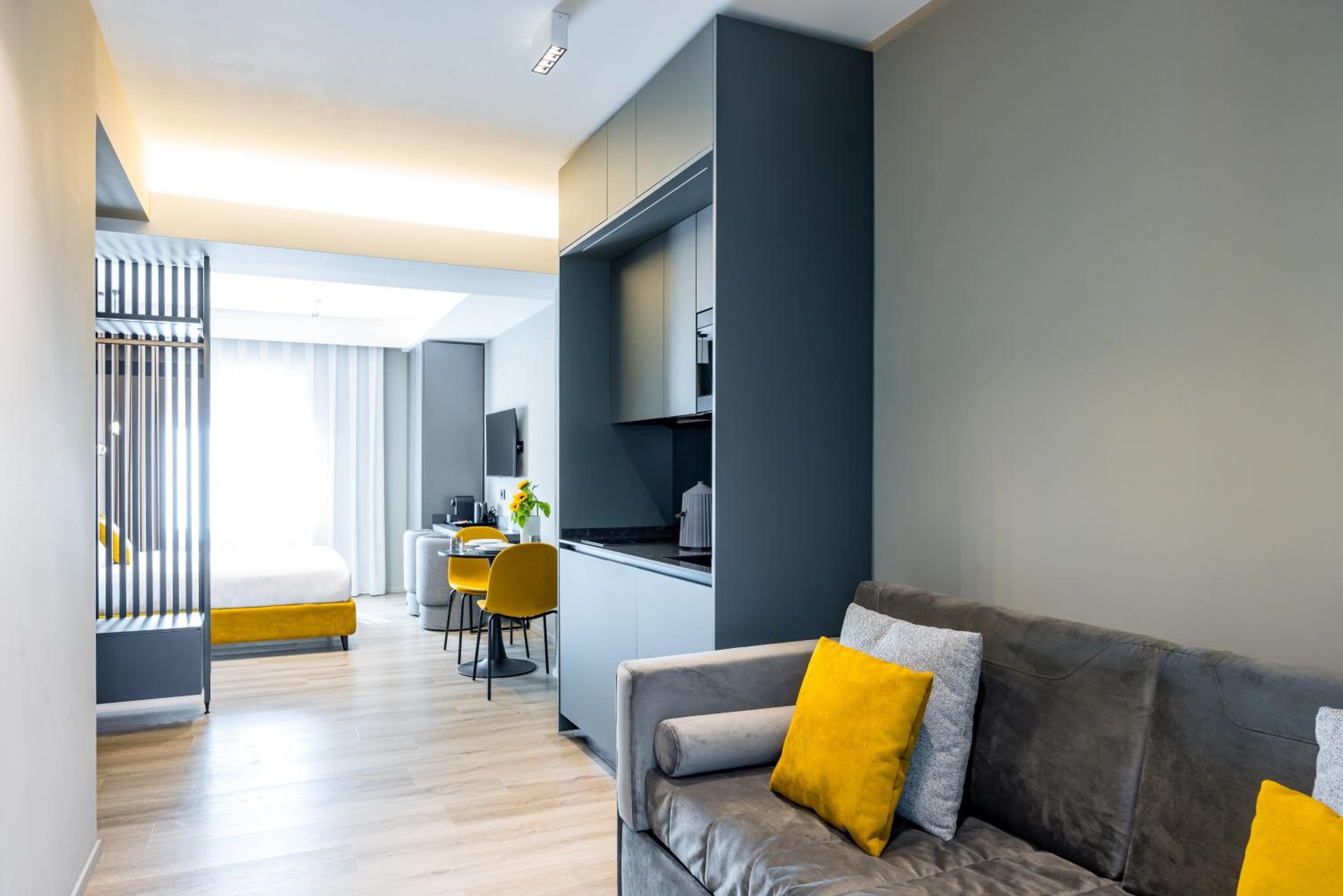MH SUITES Plebiscito