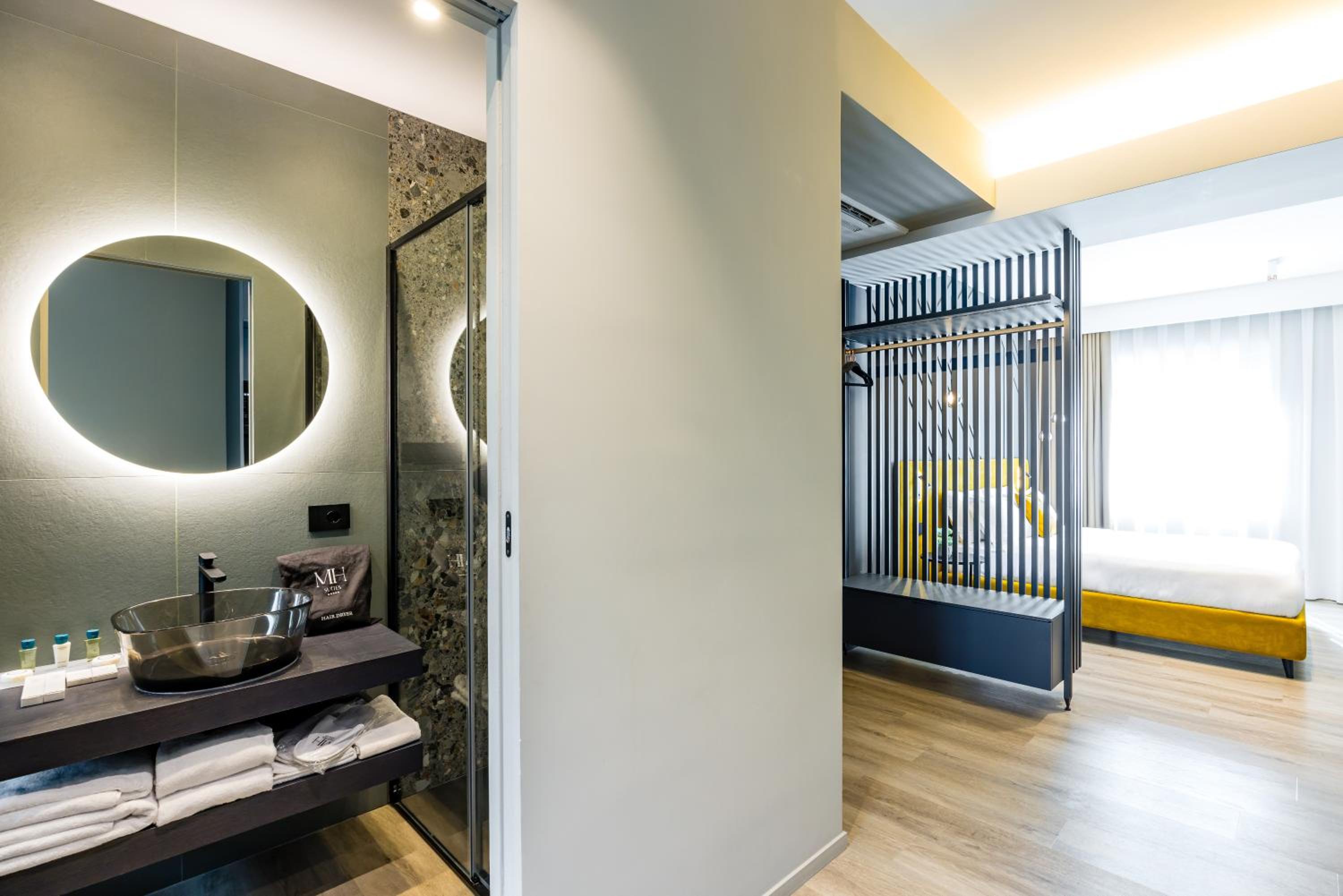 MH SUITES Plebiscito