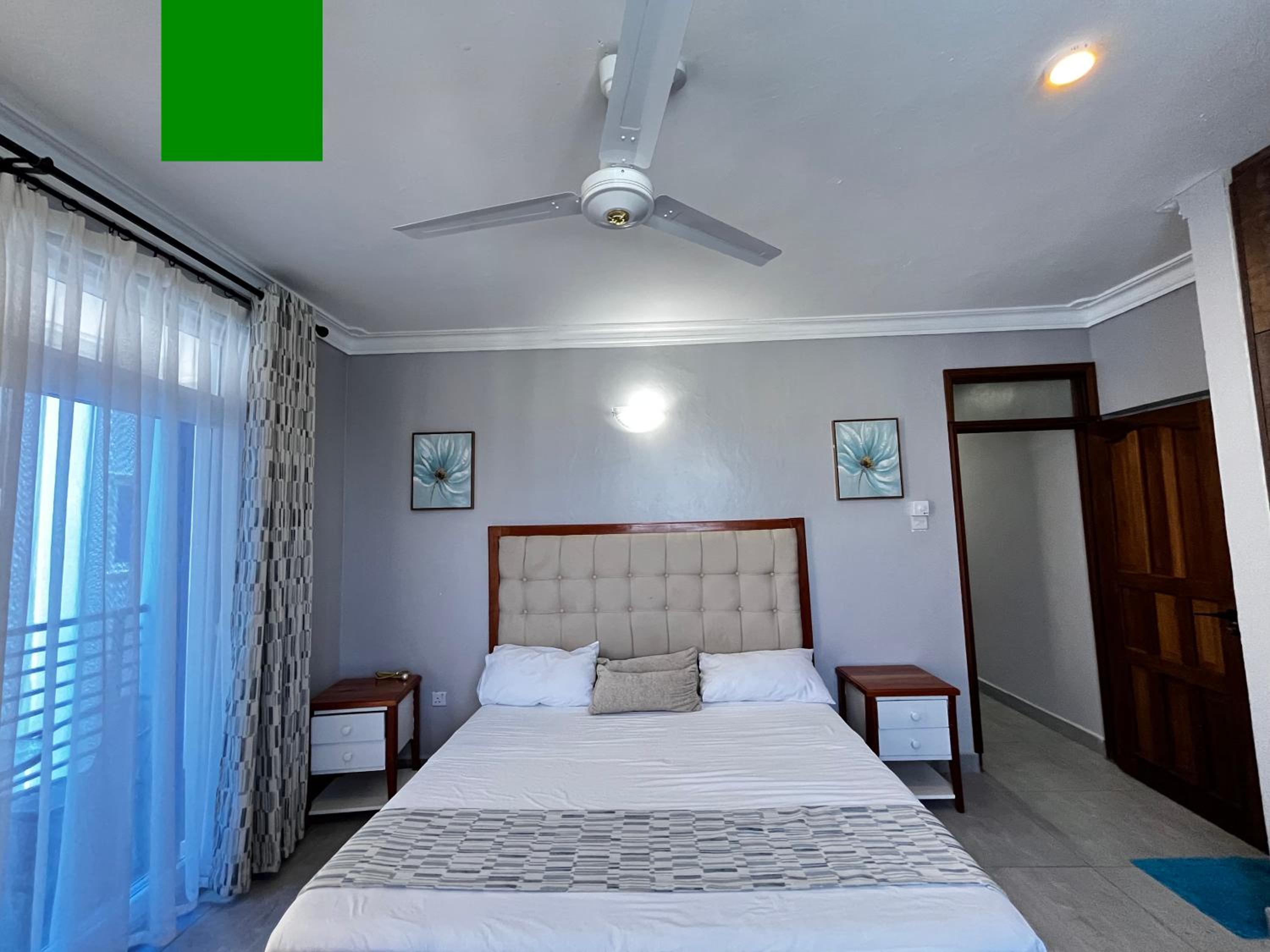 Exquisite Homes & Suites view 4