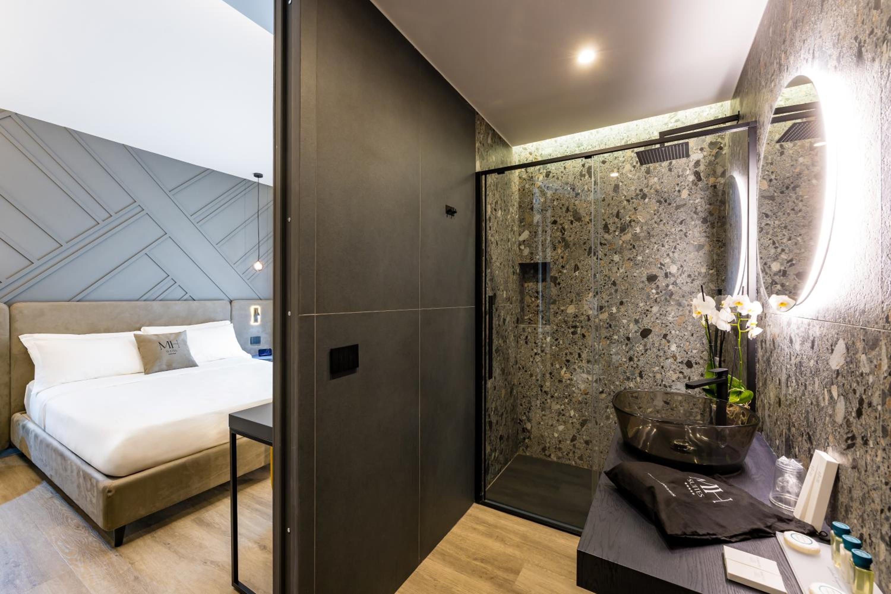 MH SUITES Plebiscito