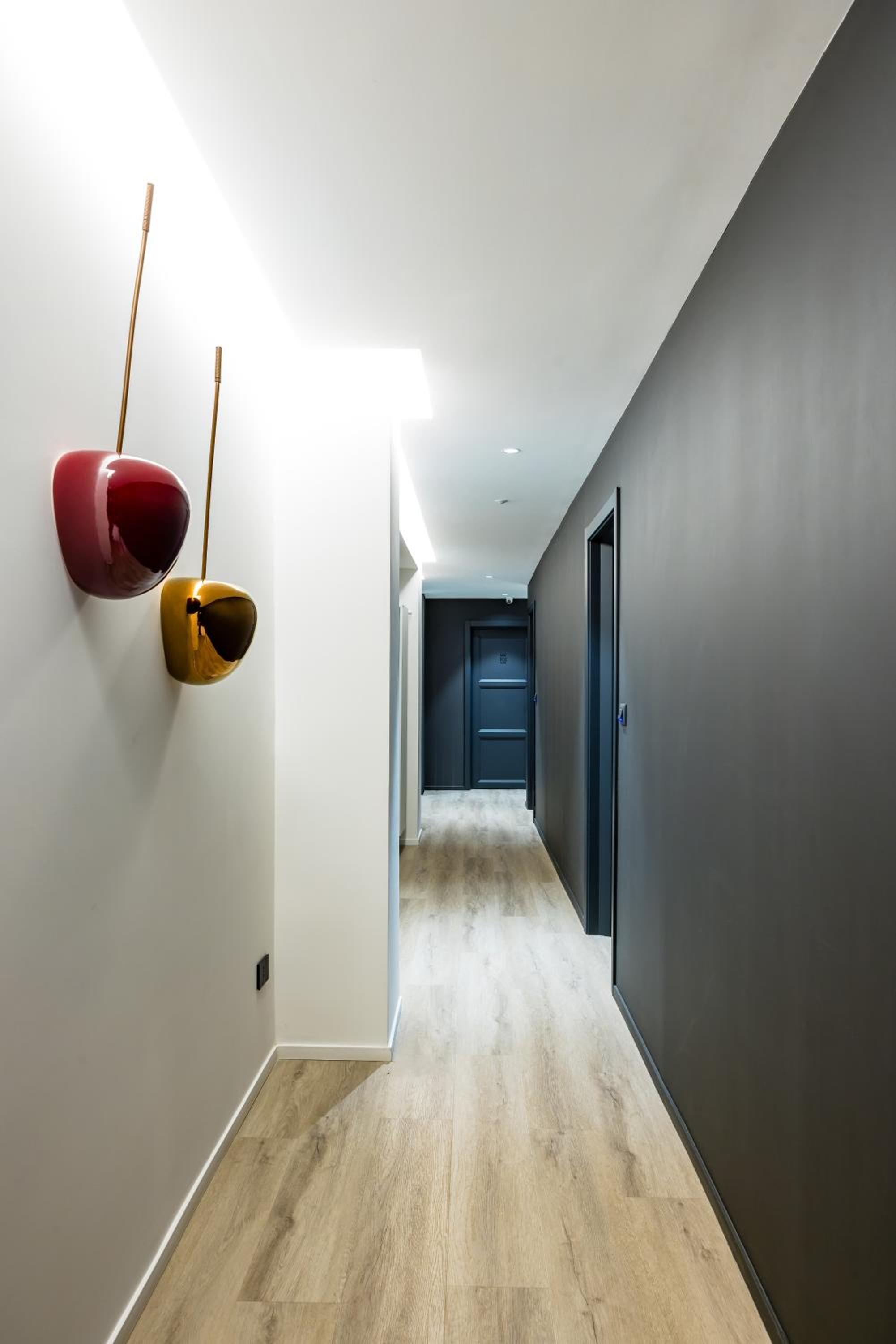 MH SUITES Plebiscito