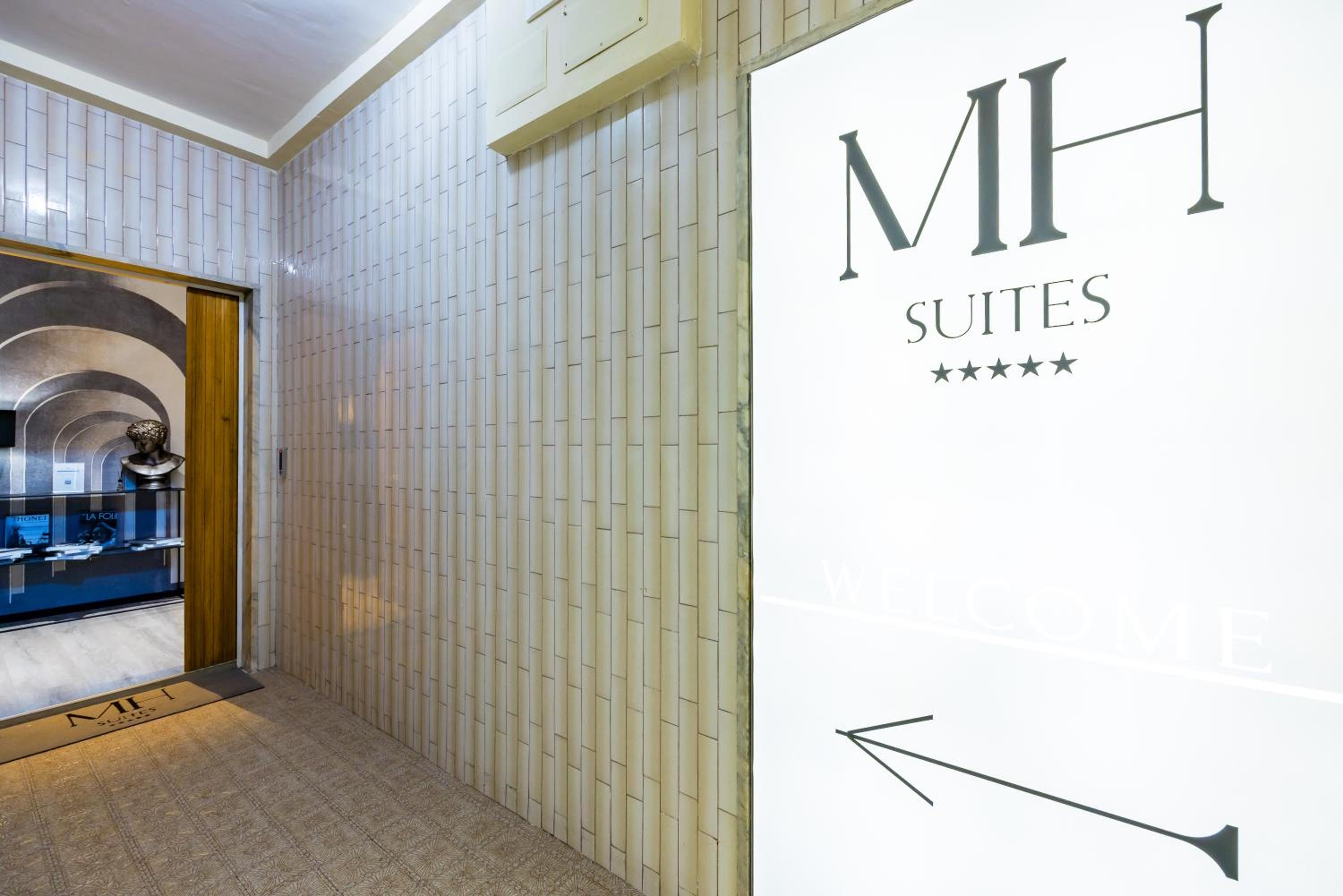 MH SUITES Plebiscito