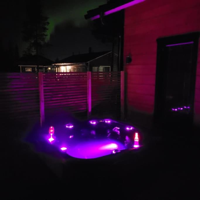 Modern log house with jacuzzi and sauna