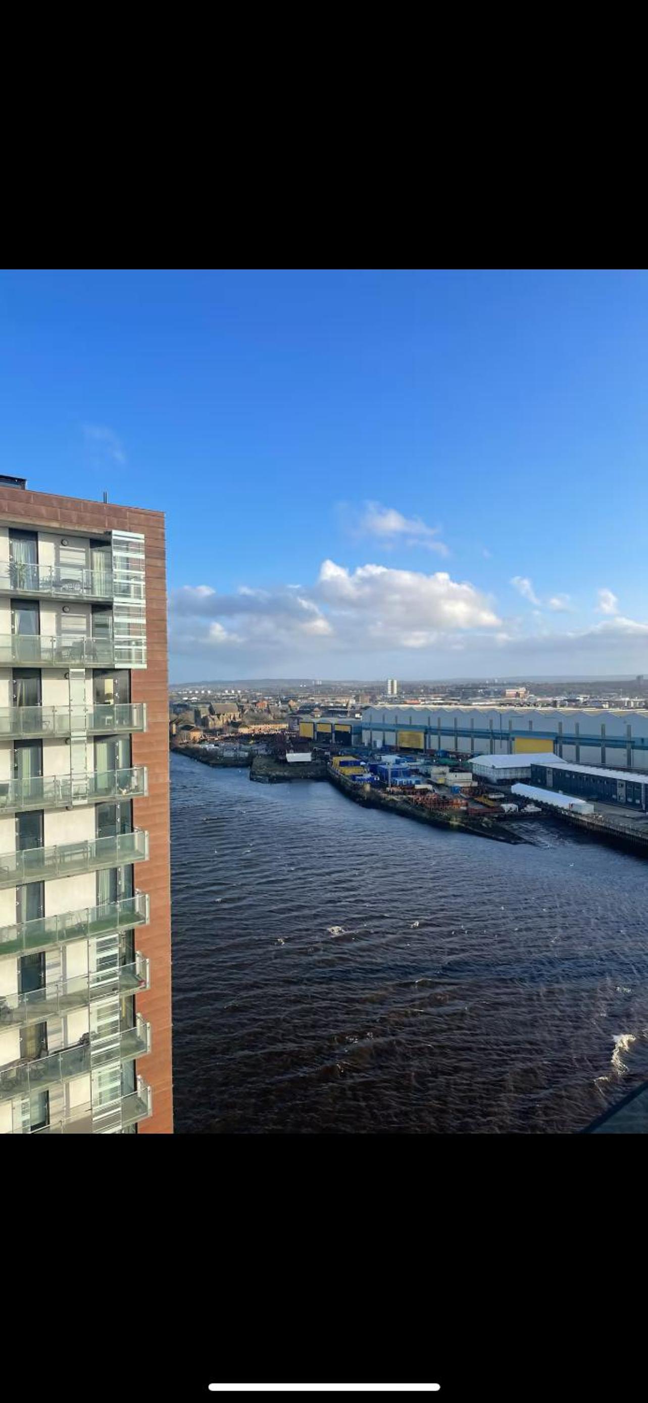 Apartment at Glasgow Harbour with balcony City and River view