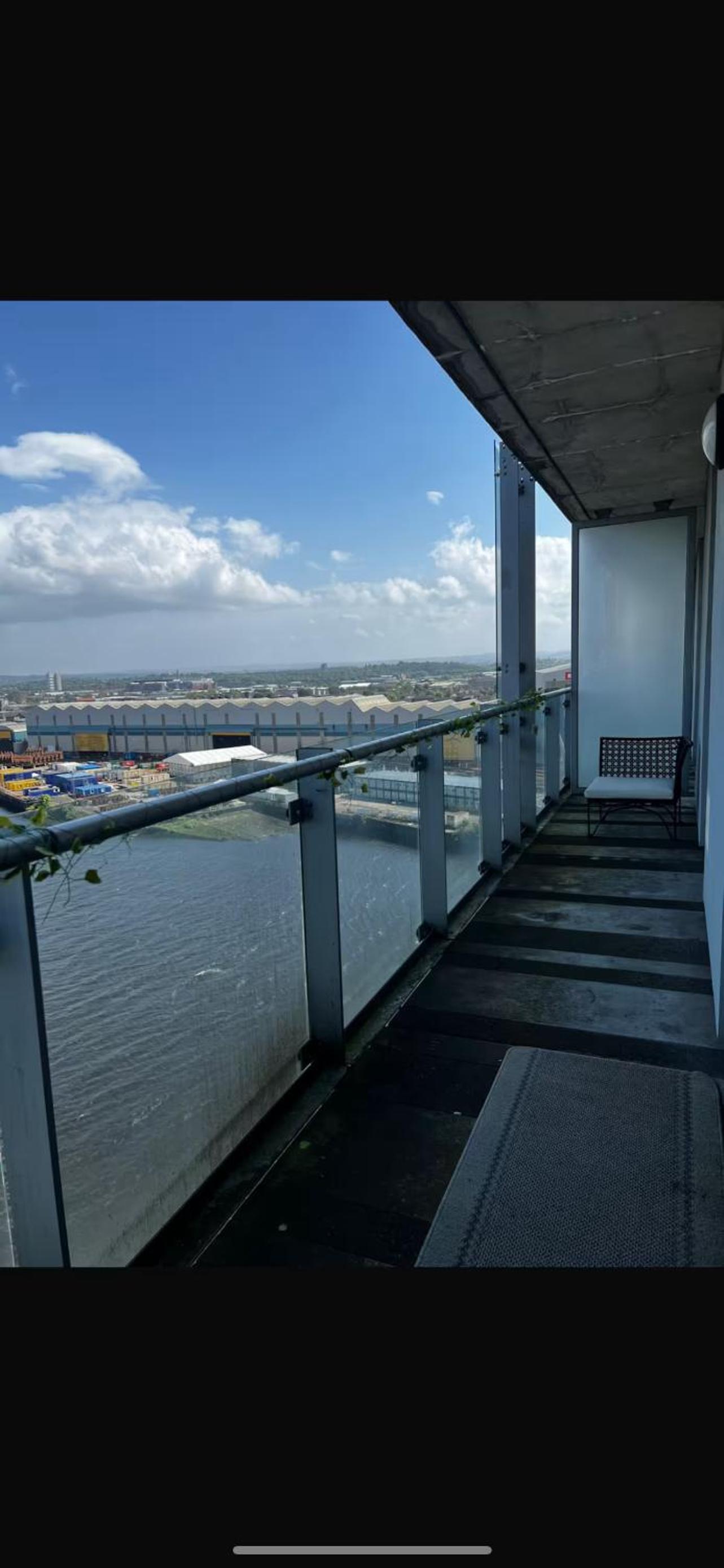Apartment at Glasgow Harbour with balcony City and River view