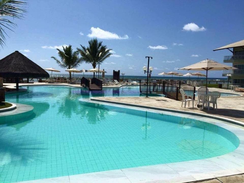 Flat Beira-Mar no Marupiara Suítes por Yolo
