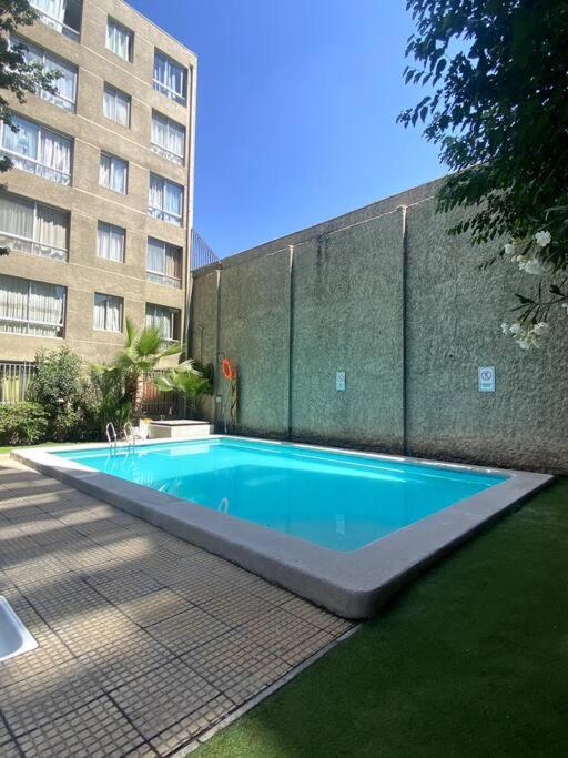 Departamento cercano Movistar Arenas 703