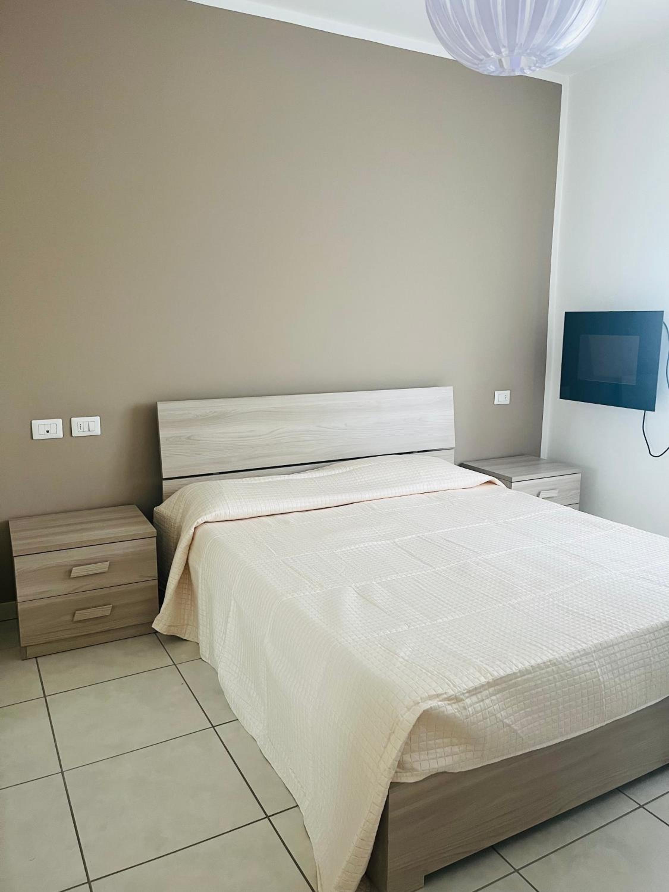 Casa Enea en Olbia — bedroom