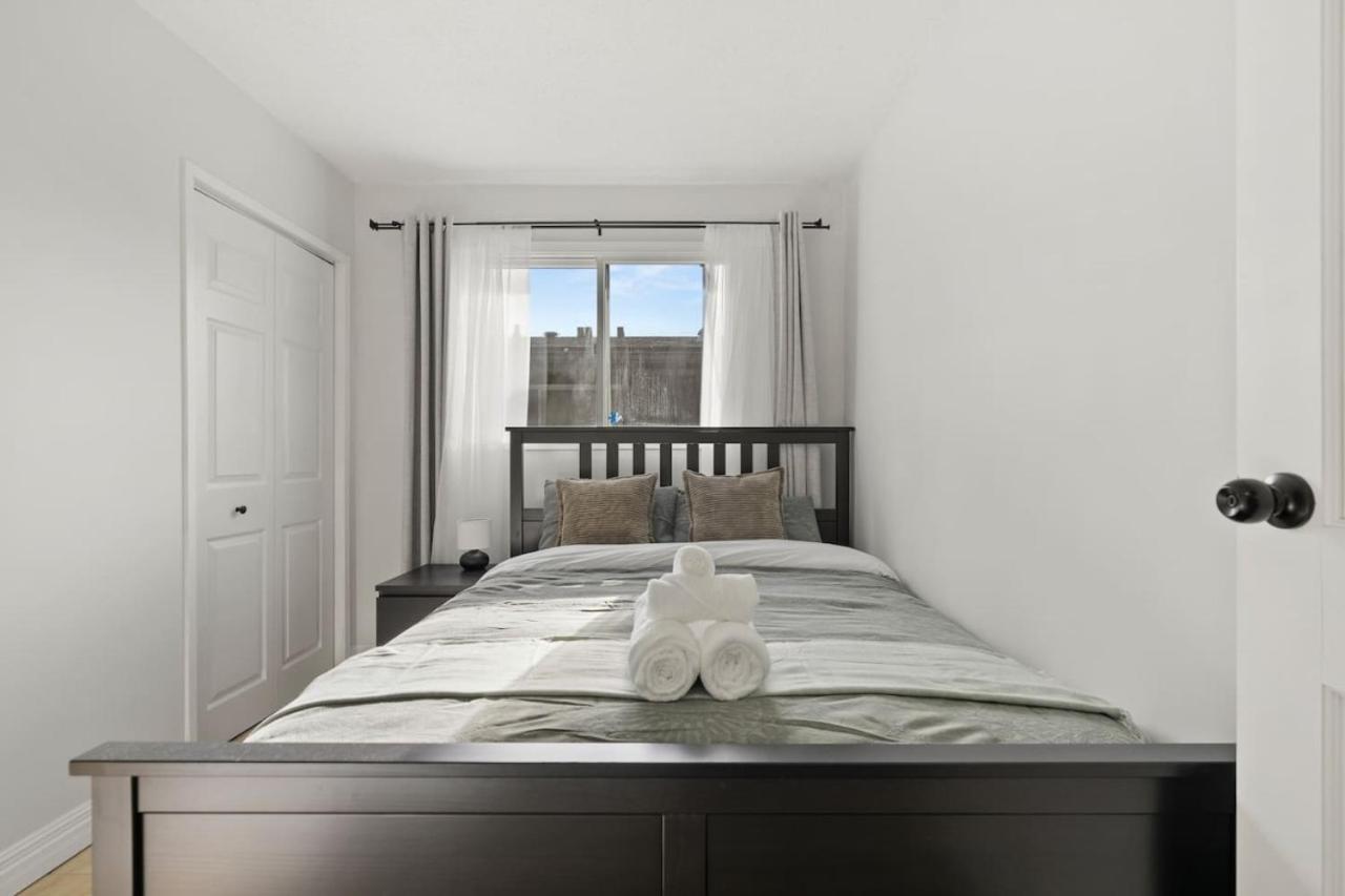 Spacious 4-Bedroom Retreat Near Bow River with Foosball, Dart Board, Movie Room