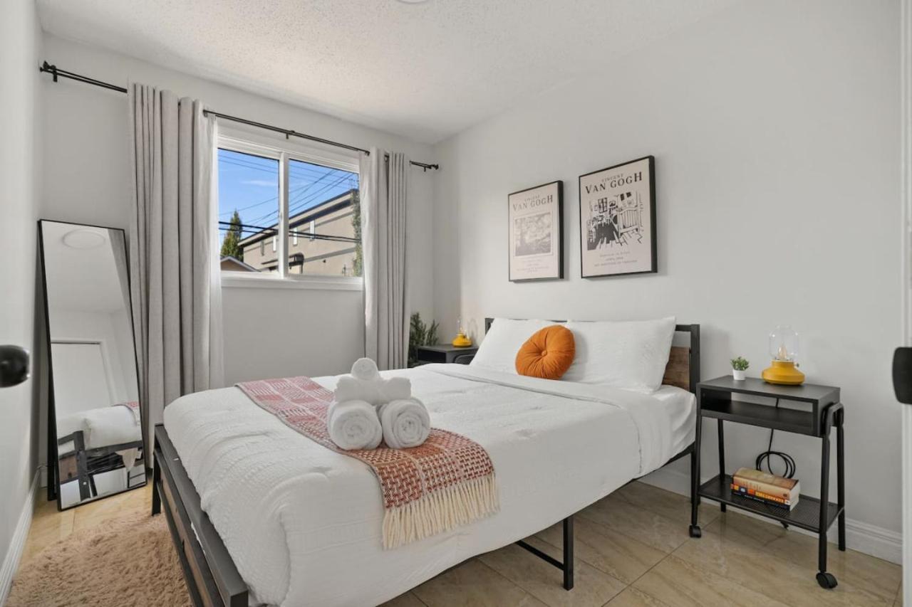 Spacious 4-Bedroom Retreat Near Bow River with Foosball, Dart Board, Movie Room