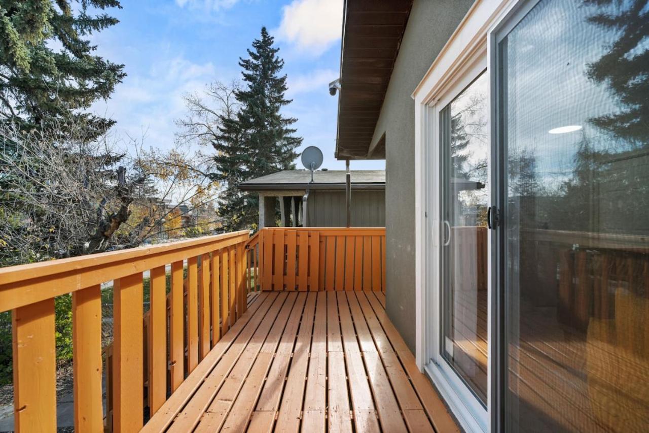 Spacious 4-Bedroom Retreat Near Bow River with Foosball, Dart Board, Movie Room