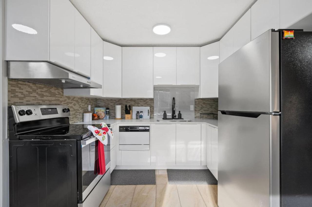 Spacious 4-Bedroom Retreat Near Bow River with Foosball, Dart Board, Movie Room