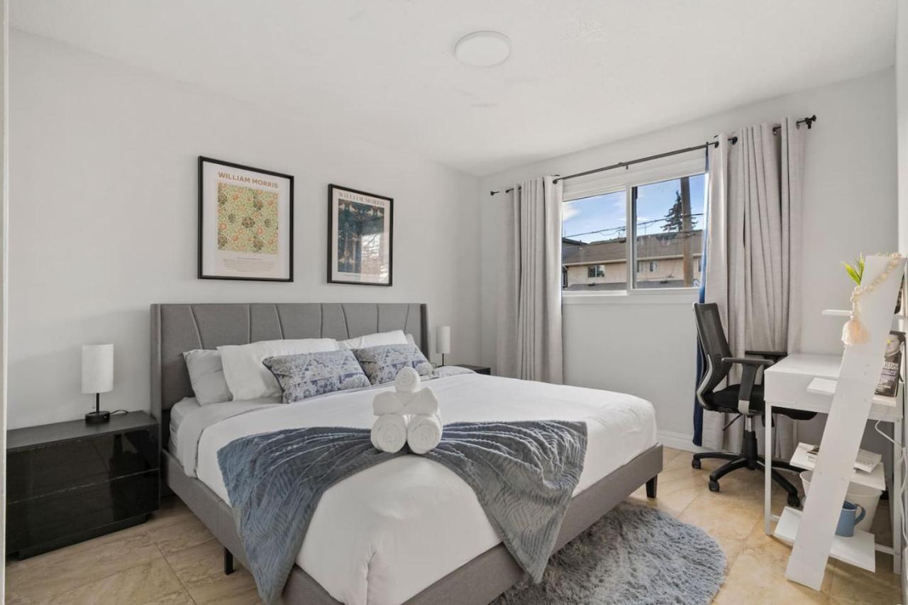 Spacious 4-Bedroom Retreat Near Bow River with Foosball, Dart Board, Movie Room