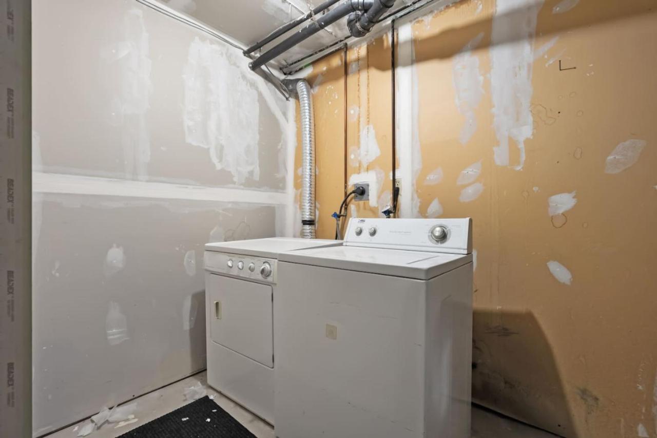 Spacious 4-Bedroom Retreat Near Bow River with Foosball, Dart Board, Movie Room