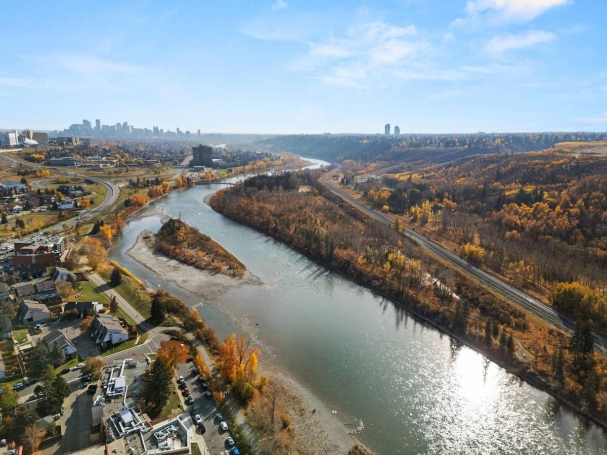 Spacious 4-Bedroom Retreat Near Bow River with Foosball, Dart Board, Movie Room