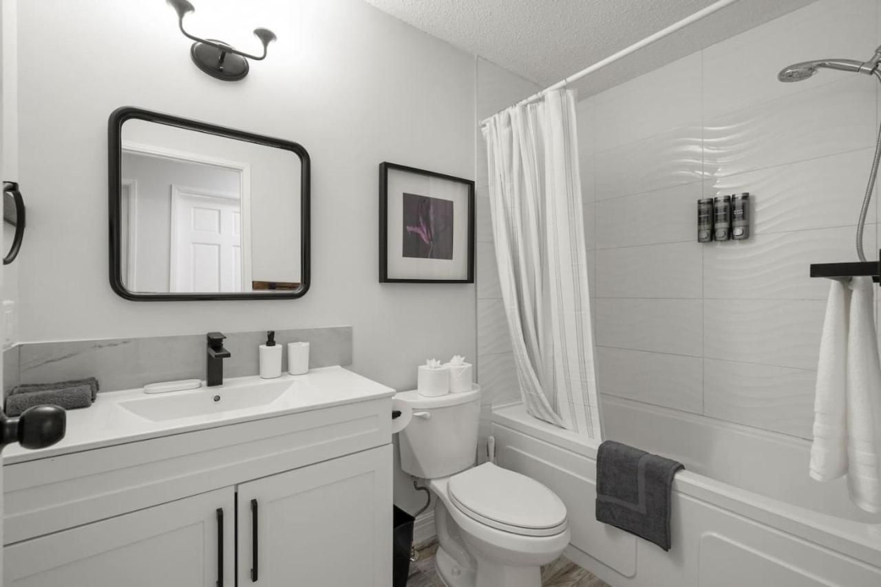 Spacious 4-Bedroom Retreat Near Bow River with Foosball, Dart Board, Movie Room
