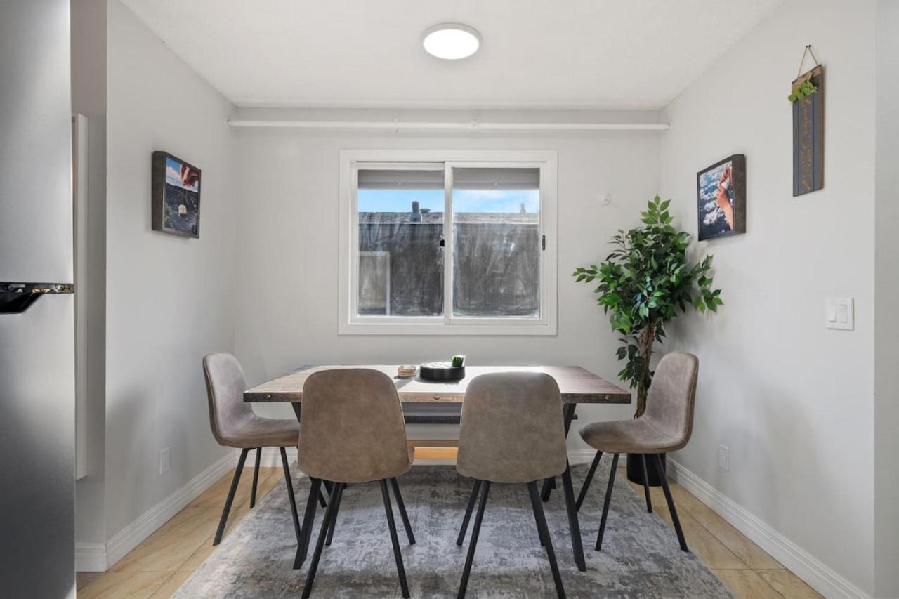 Spacious 4-Bedroom Retreat Near Bow River with Foosball, Dart Board, Movie Room