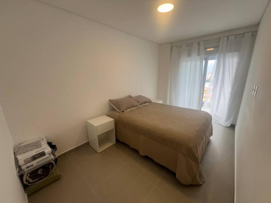 BG - Apartamento alto padrão à beira-mar em Bertioga