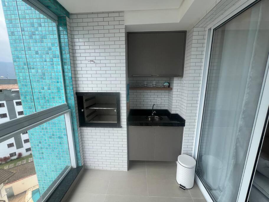 BG - Apartamento alto padrão à beira-mar em Bertioga