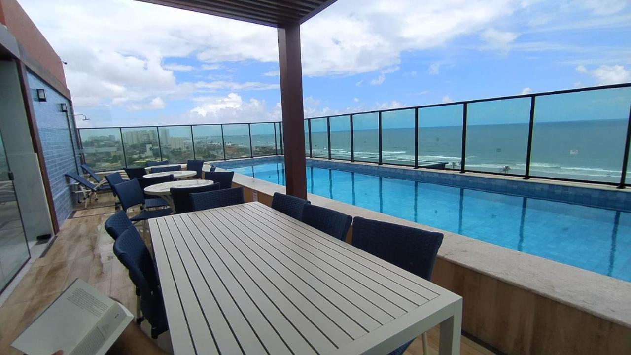 Apartamento Quarto e Sala, varanda, vista mar com infraestrutura
