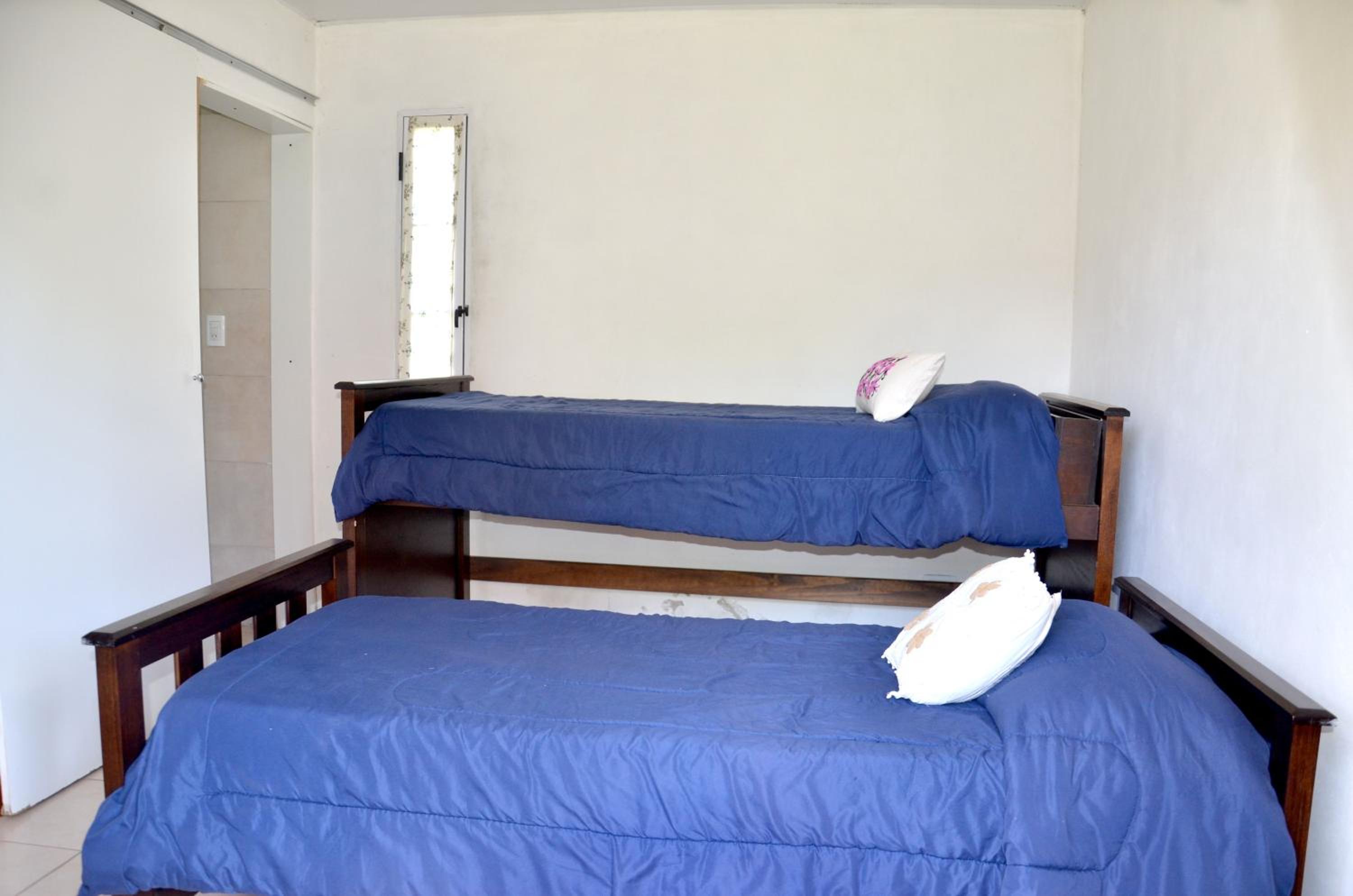 Hermosa casa hasta 4 pax con jardín y estacionamiento