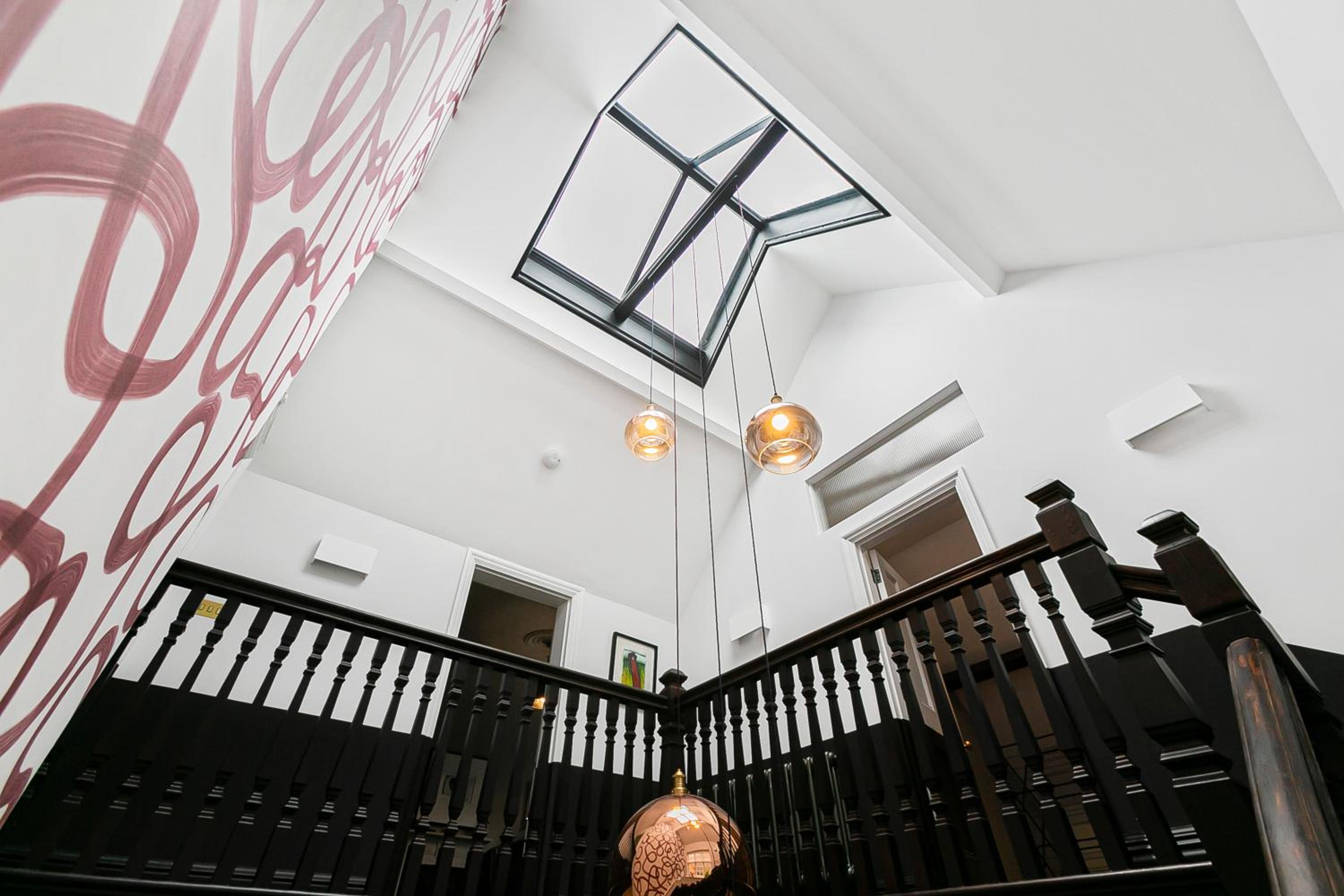 The Vicarage by Hostara Homes, a luxury 4 bedroom designer home in Highgate, perfect for families and groups