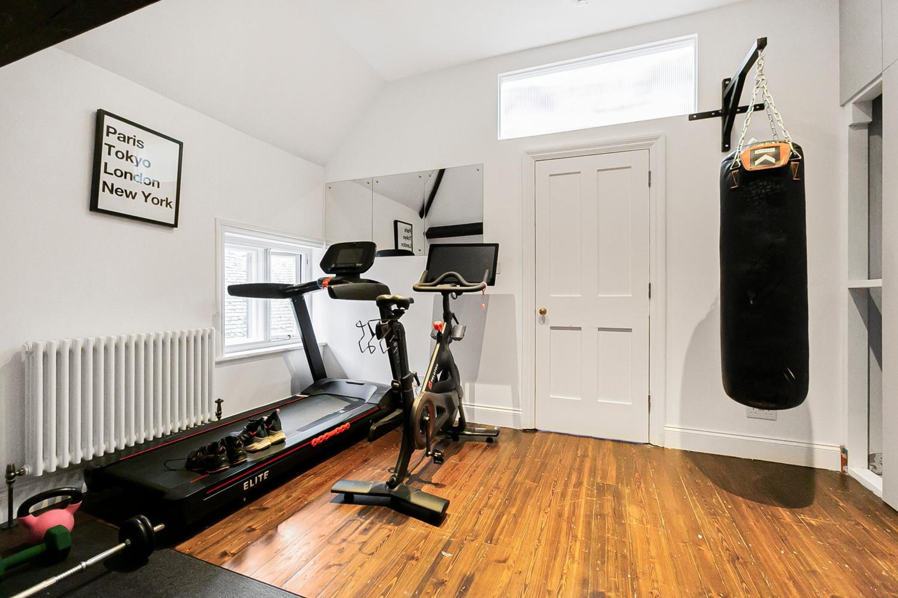 The Vicarage by Hostara Homes, a luxury 4 bedroom designer home in Highgate, perfect for families and groups