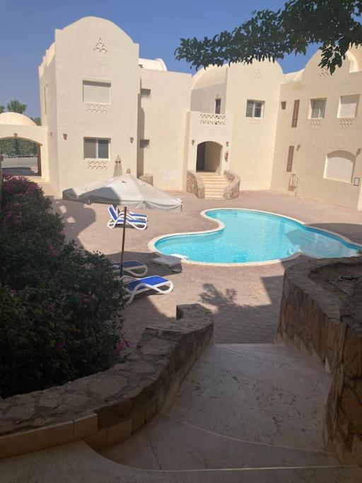 Lovely flat with balcony and shared pool