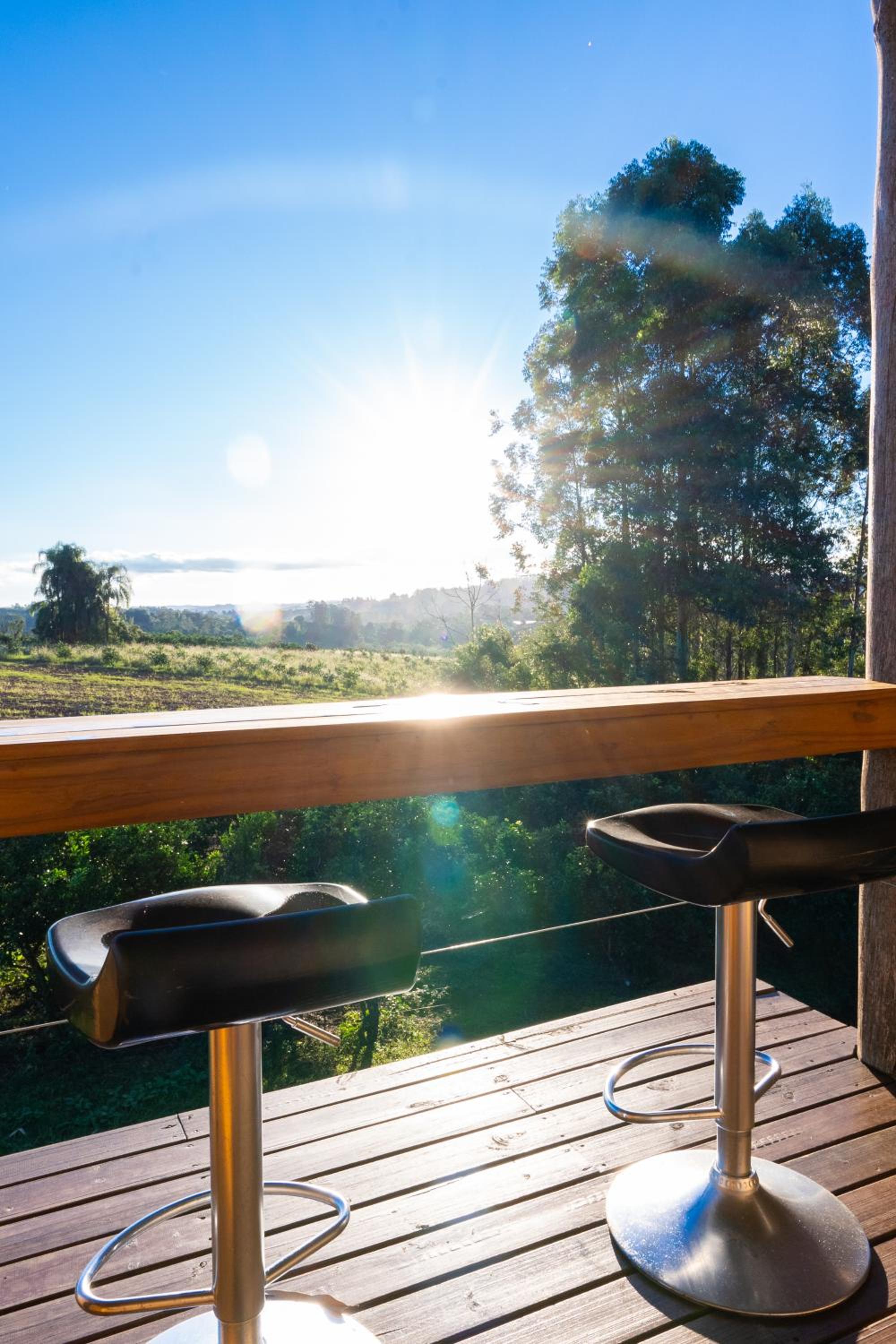 Chalé romântico com jacuzzi e vista do pôr-do-sol