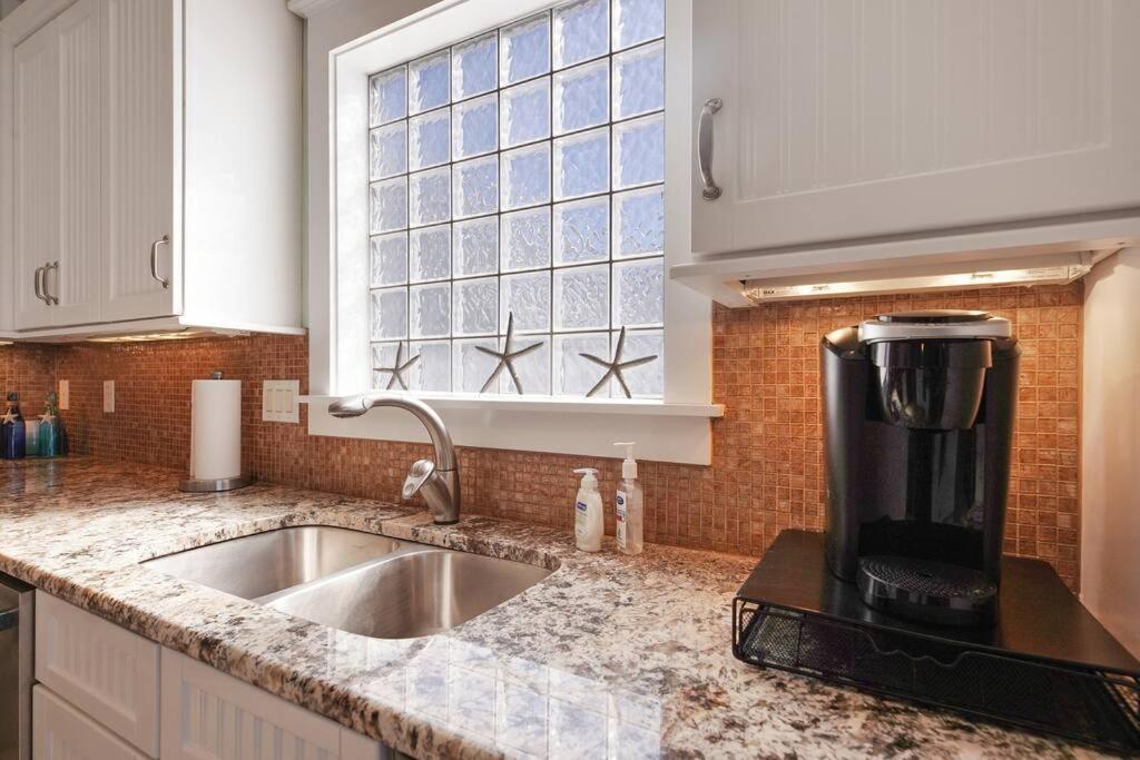 Charming Canal Home with Private Heated Pool and Boat Lift