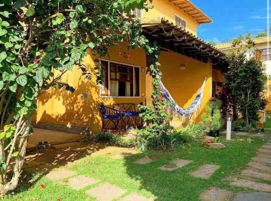 Casa em condomínio com lazer de frente para praia