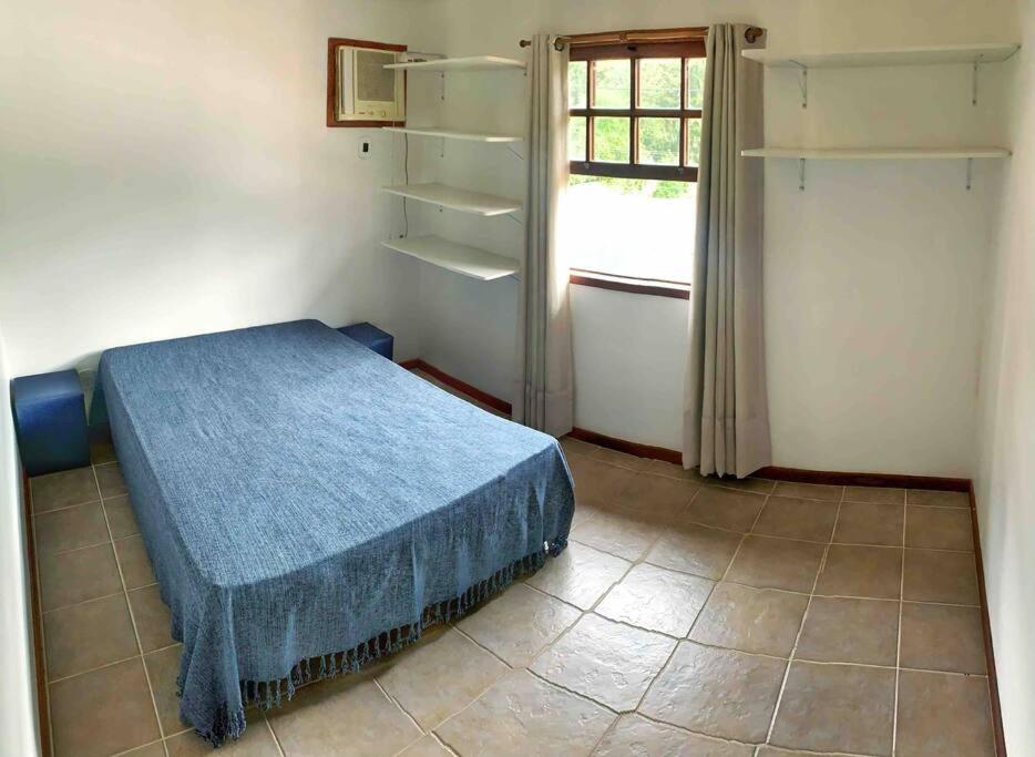 Casa em condomínio com lazer de frente para praia