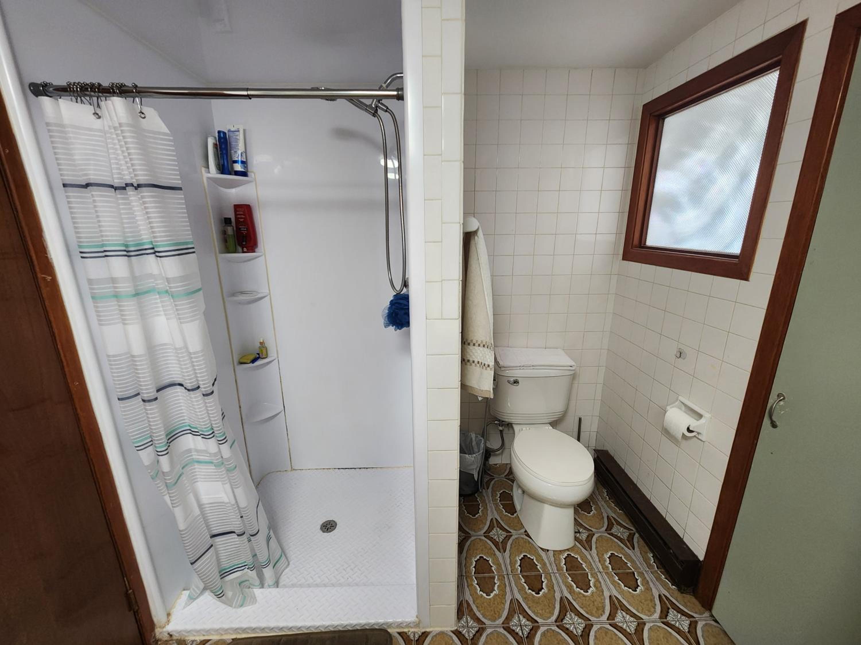 Private room with shared space in a basement