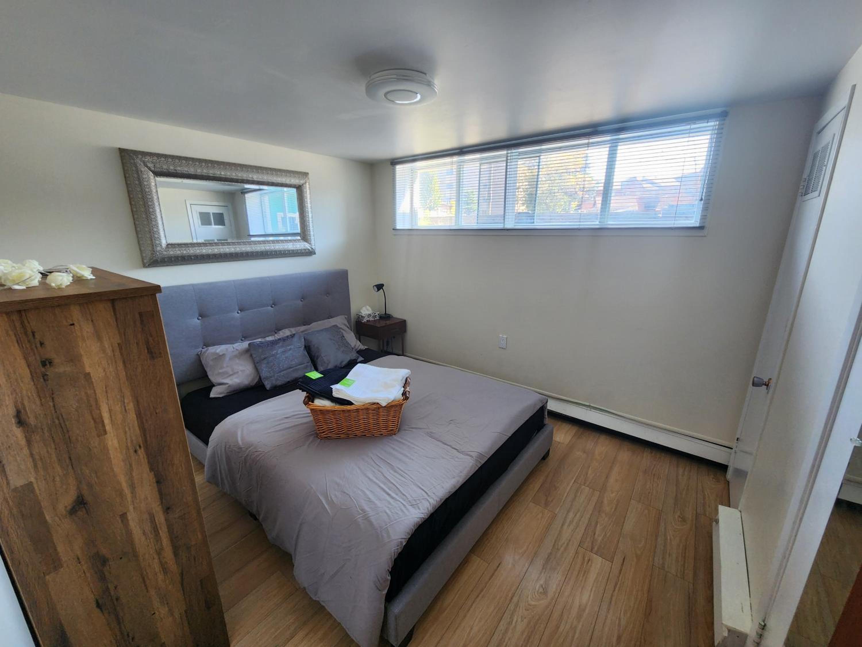Private room with shared space in a basement