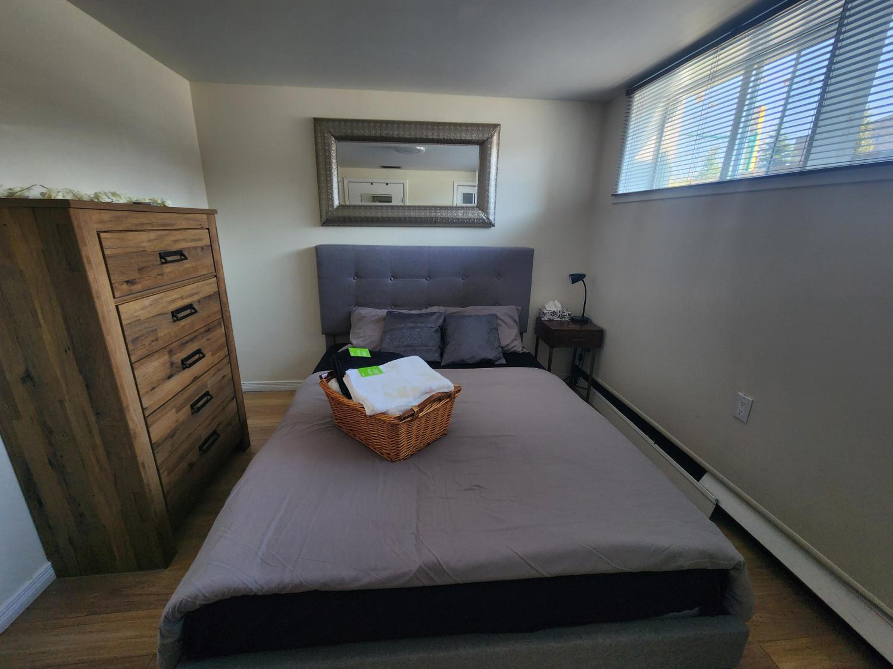 Private room with shared space in a basement