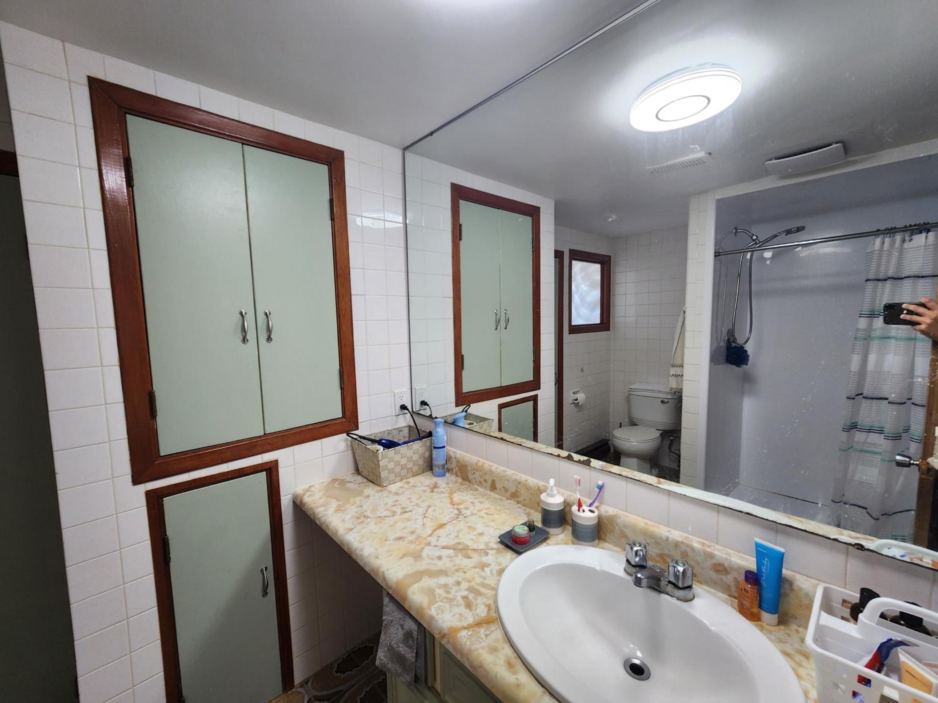 Private room with shared space in a basement