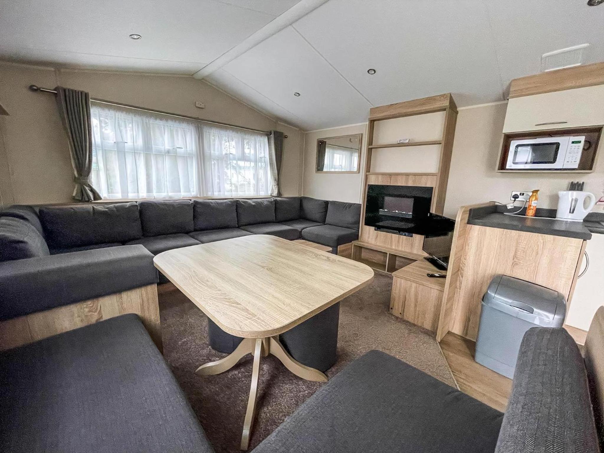 Lovely Caravan With Decking And Outside Furniture At Broadland Sands Ref 20113Bs view 2