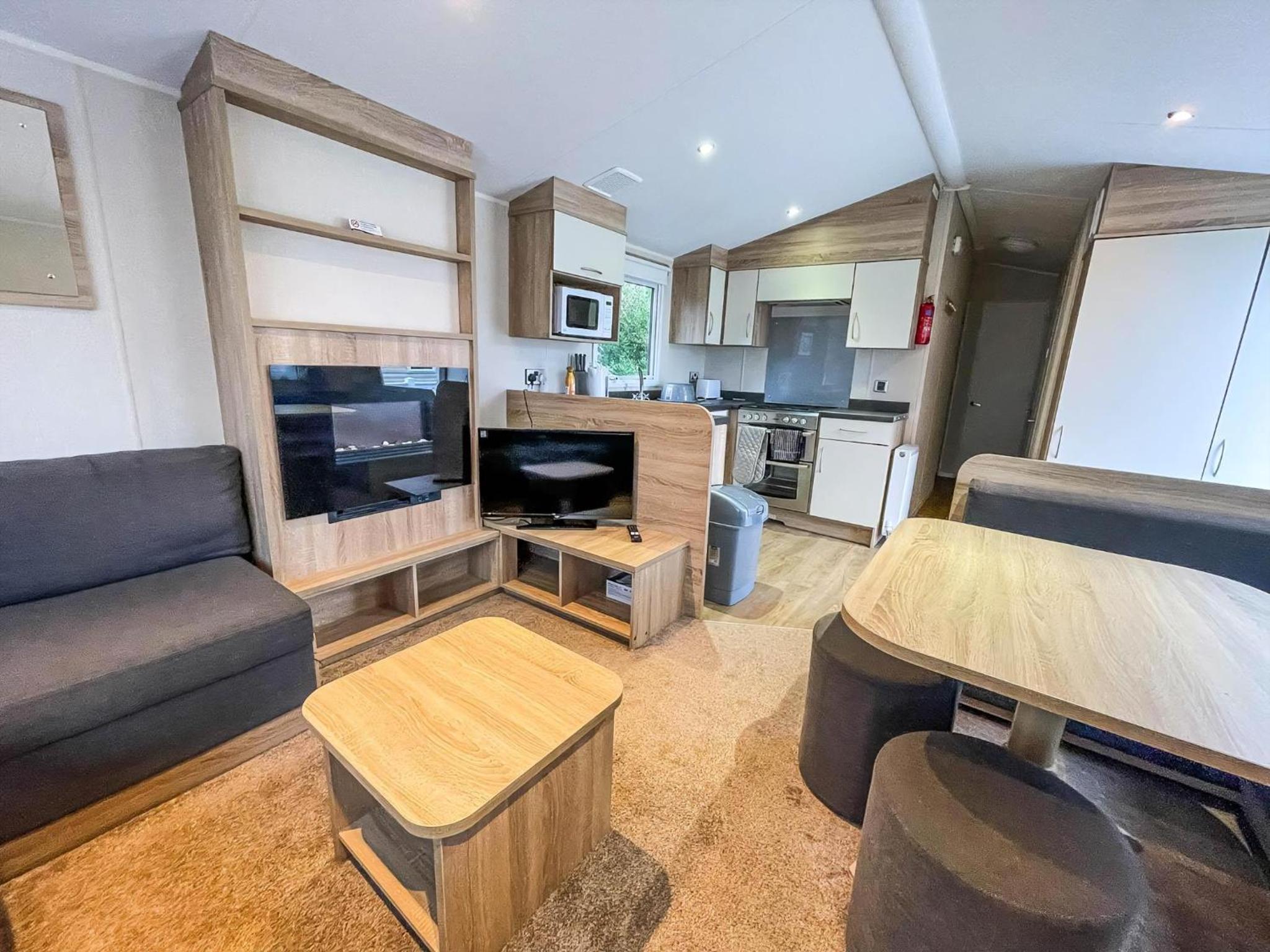 Lovely Caravan With Decking And Outside Furniture At Broadland Sands Ref 20113Bs view 4
