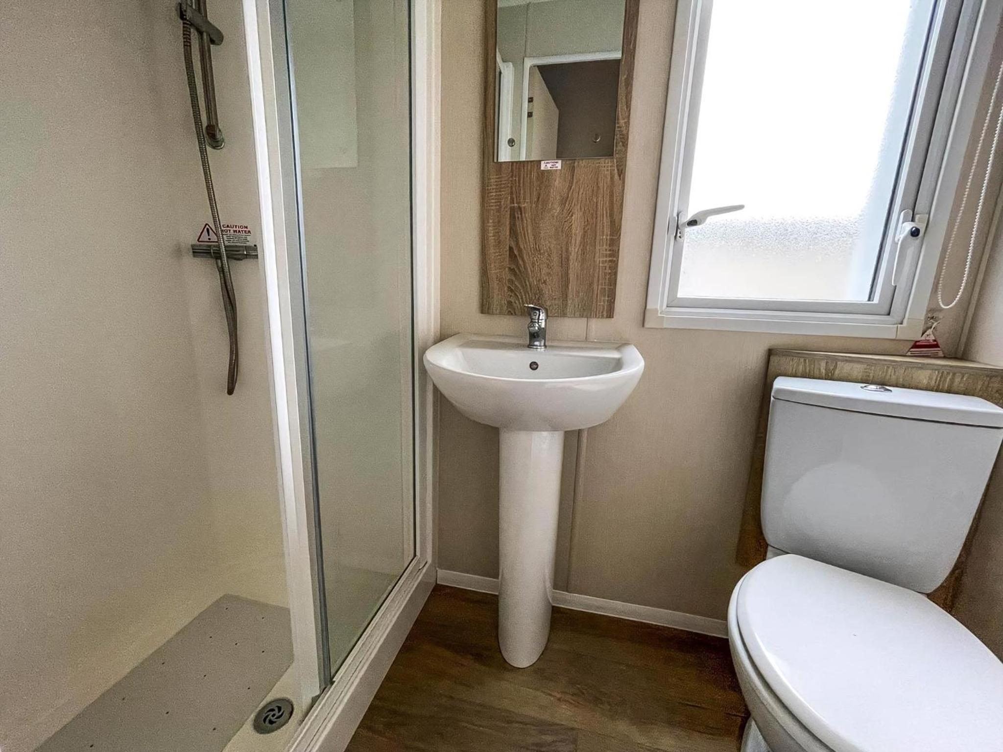 Lovely Caravan With Decking And Outside Furniture At Broadland Sands Ref 20113Bs view 5