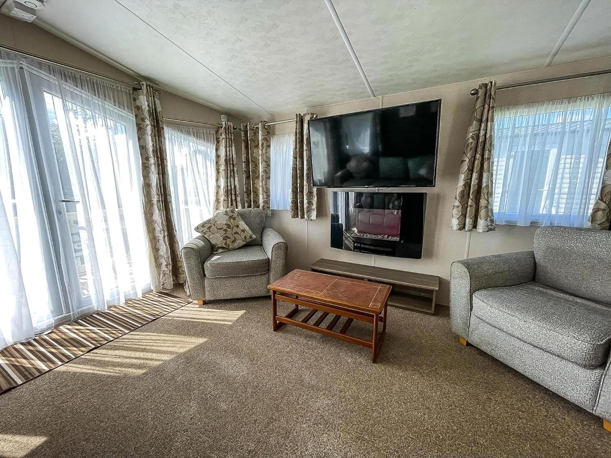 Lovely 8 Berth Caravan With Decking And Nearby Scratby Beach Ref 50005A view 2