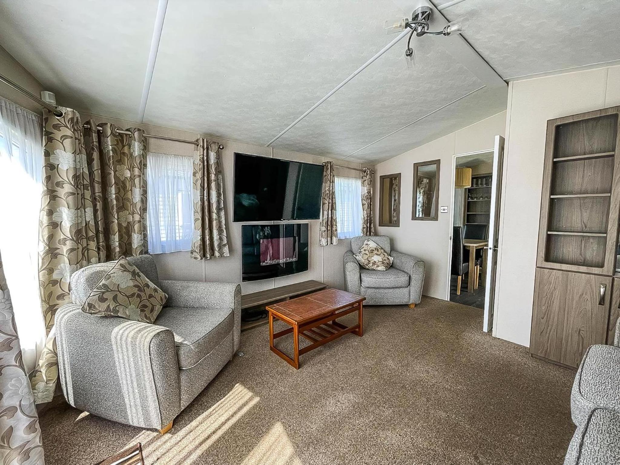 Lovely 8 Berth Caravan With Decking And Nearby Scratby Beach Ref 50005A view 3