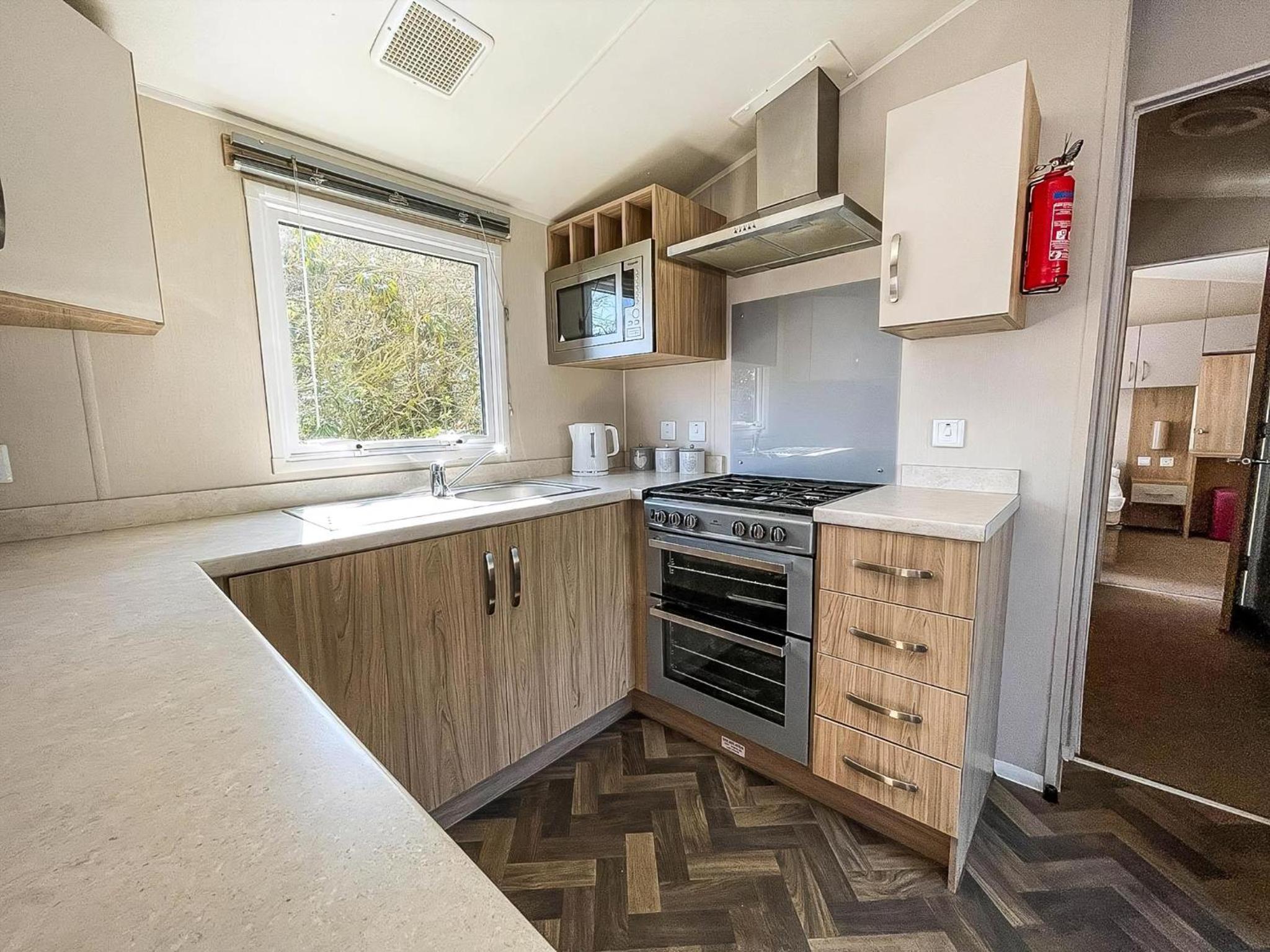 Modern Caravan With Decking At Azure Seas Along The Suffolk Coast Ref 32065Az view 3