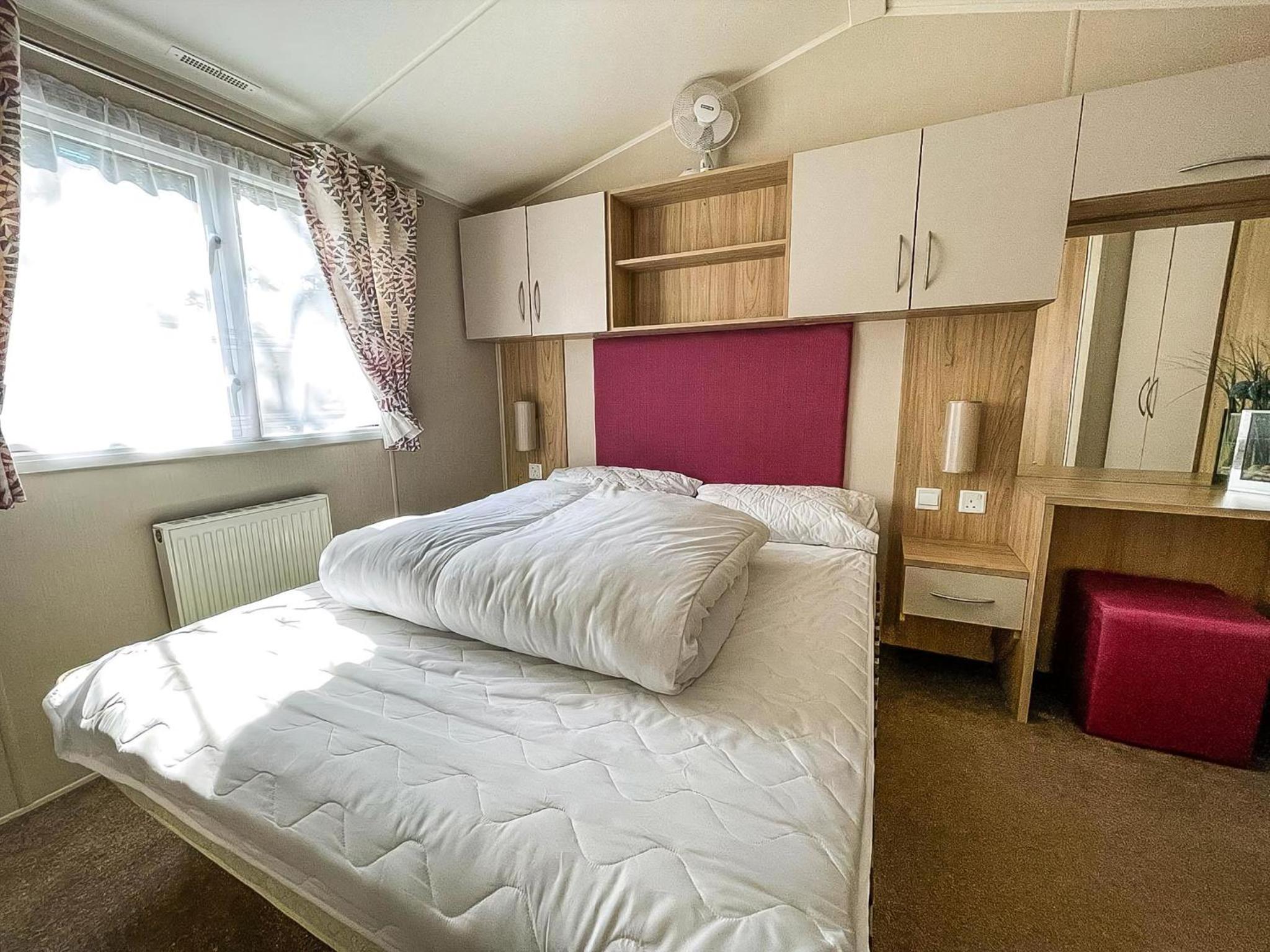 Modern Caravan With Decking At Azure Seas Along The Suffolk Coast Ref 32065Az view 4