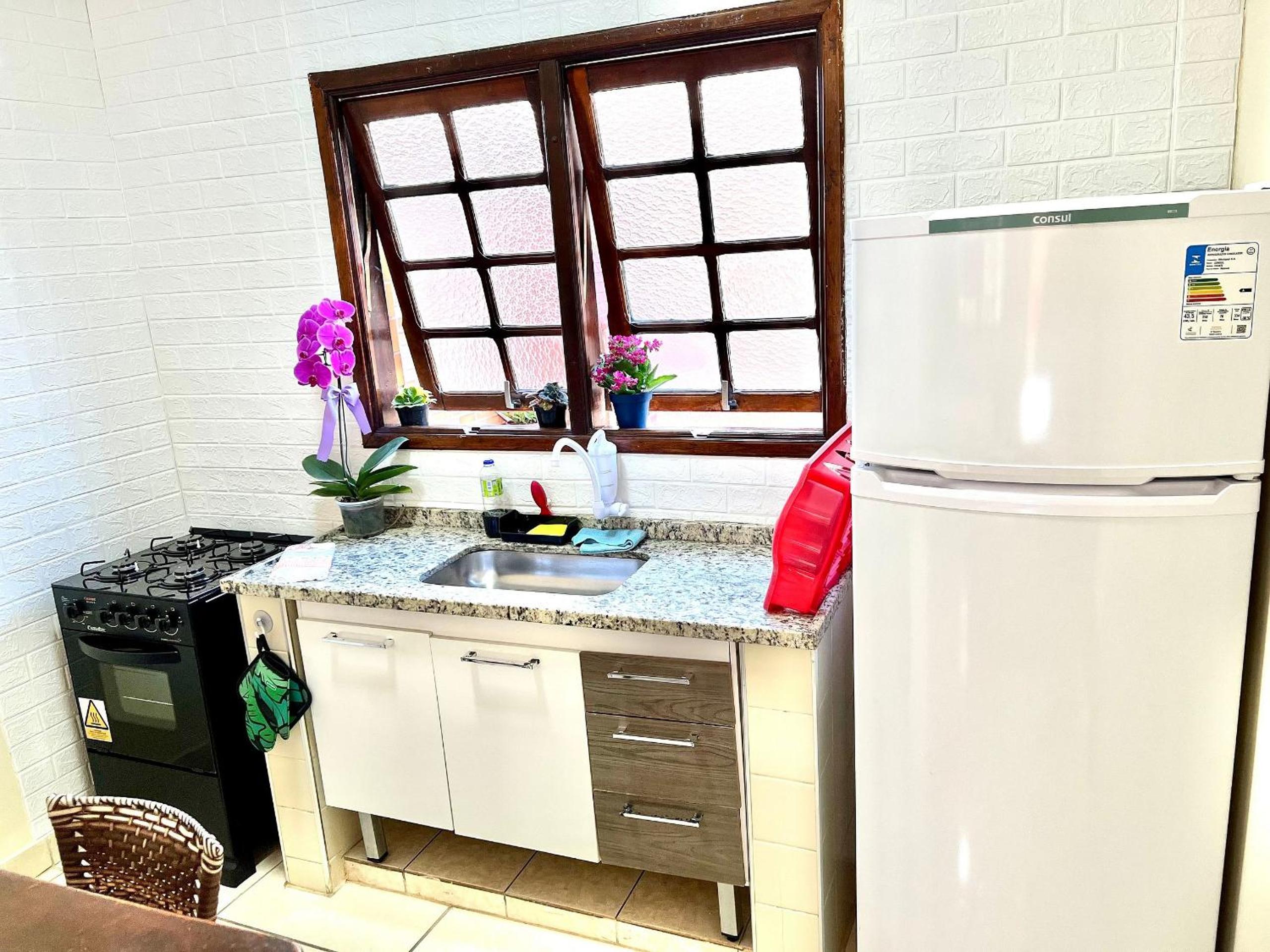 Studio pé na areia com área de churrasco privativa